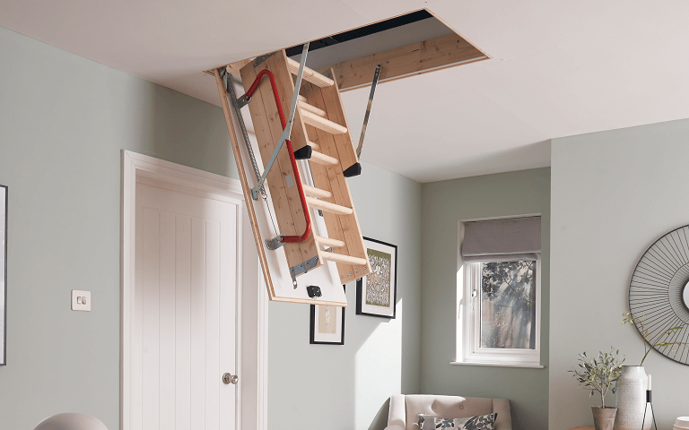 Werner UK loft ladders with a space-saving design stored in loft hatch